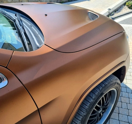 Jeep Grand Cherokee cena 98500 przebieg: 209000, rok produkcji 2014 z Jasień małe 154